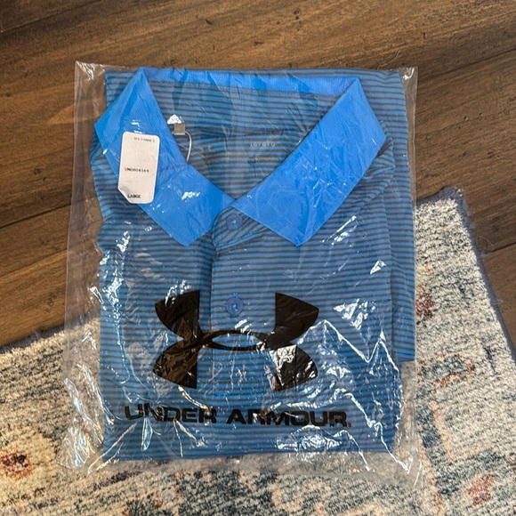 Under Armour Other - Under Armour heat gear blue and gray polo size large loose fit